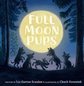 Book cover for 'Full Moon Pups' by Liz Garton Scanlon, featuring a family of wild wolf pups huddled with their mother under a massive, glowing full moon in a deep blue forest.