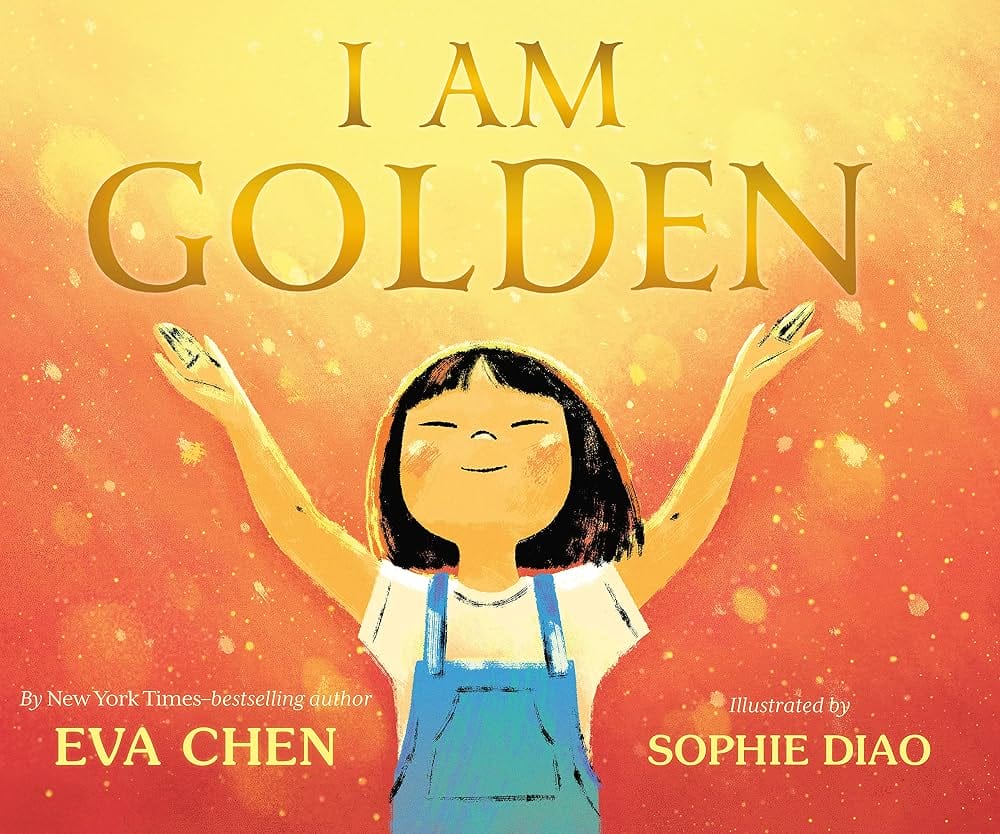 Book cover for 'I Am Golden' by Eva Chen, illustrated by Sophie Diao. A young girl with a bob haircut stands with arms raised joyfully against a glowing golden and orange background.